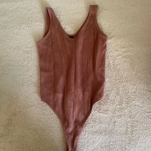 Brown body suit